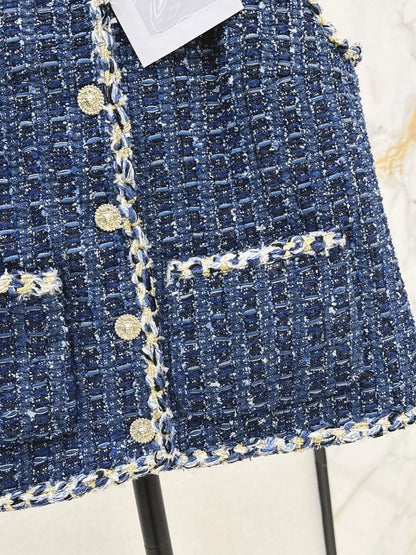 C 25 Model's sapphire blue tweed vest