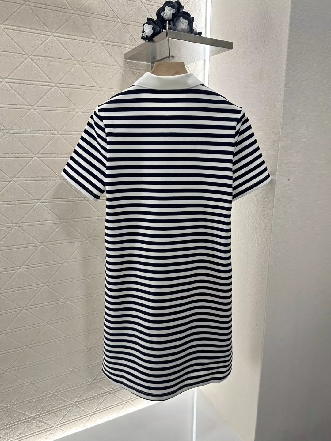 p Spring/Summer 25 Striped short-sleeved dress.