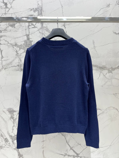 D 25 New letter-print cashmere and wool sweater.