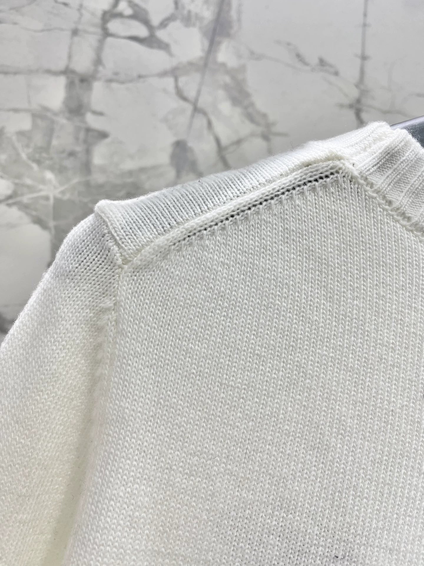 D 25 New letter-print cashmere and wool sweater.