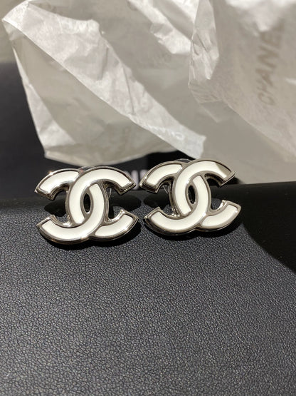 C 25 White enamel earrings