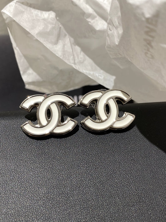 C 25 White enamel earrings