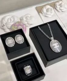 C 25 White Enamel Double C Mirrored Oval Button Necklace