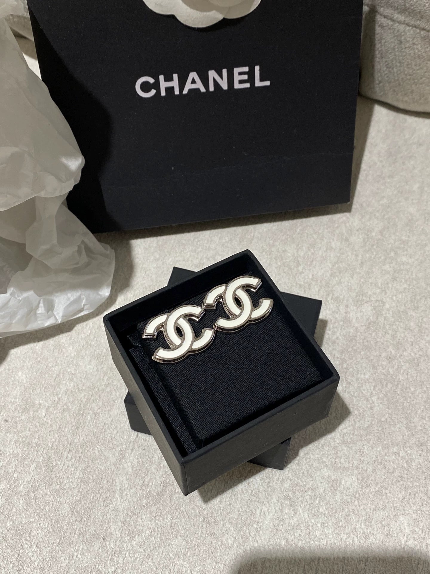 C 25 White enamel earrings
