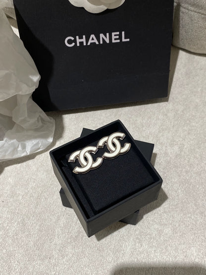 C 25 White enamel earrings