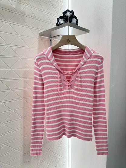 D Spring/Summer 25 Shawl-neck striped knit long-sleeve top.