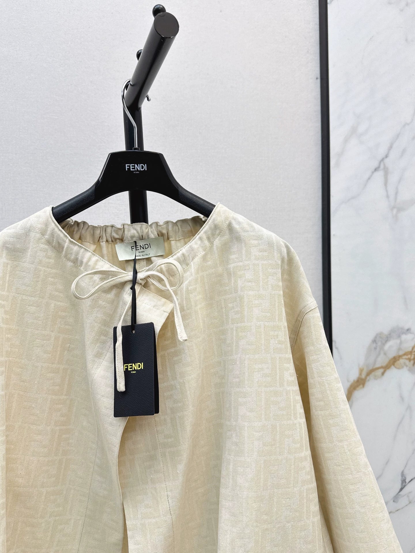 Fe 25 letter print cape coat