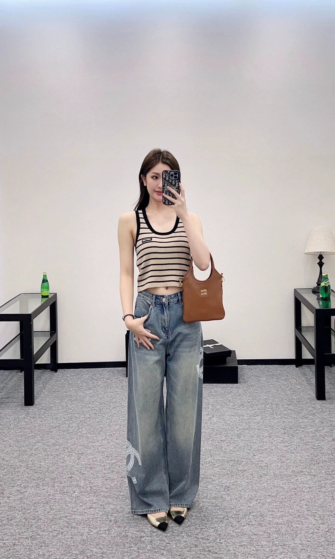 C 25 Lace-embroidered denim trousers