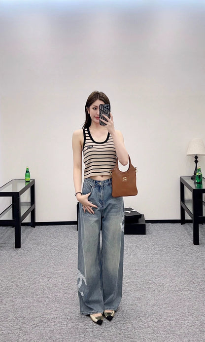 C 25 Lace-embroidered denim trousers