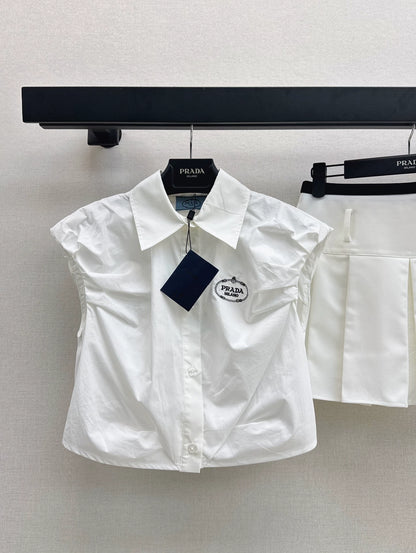 P 25 New Pleated bud sleeve blouse + pleated half skirt set
