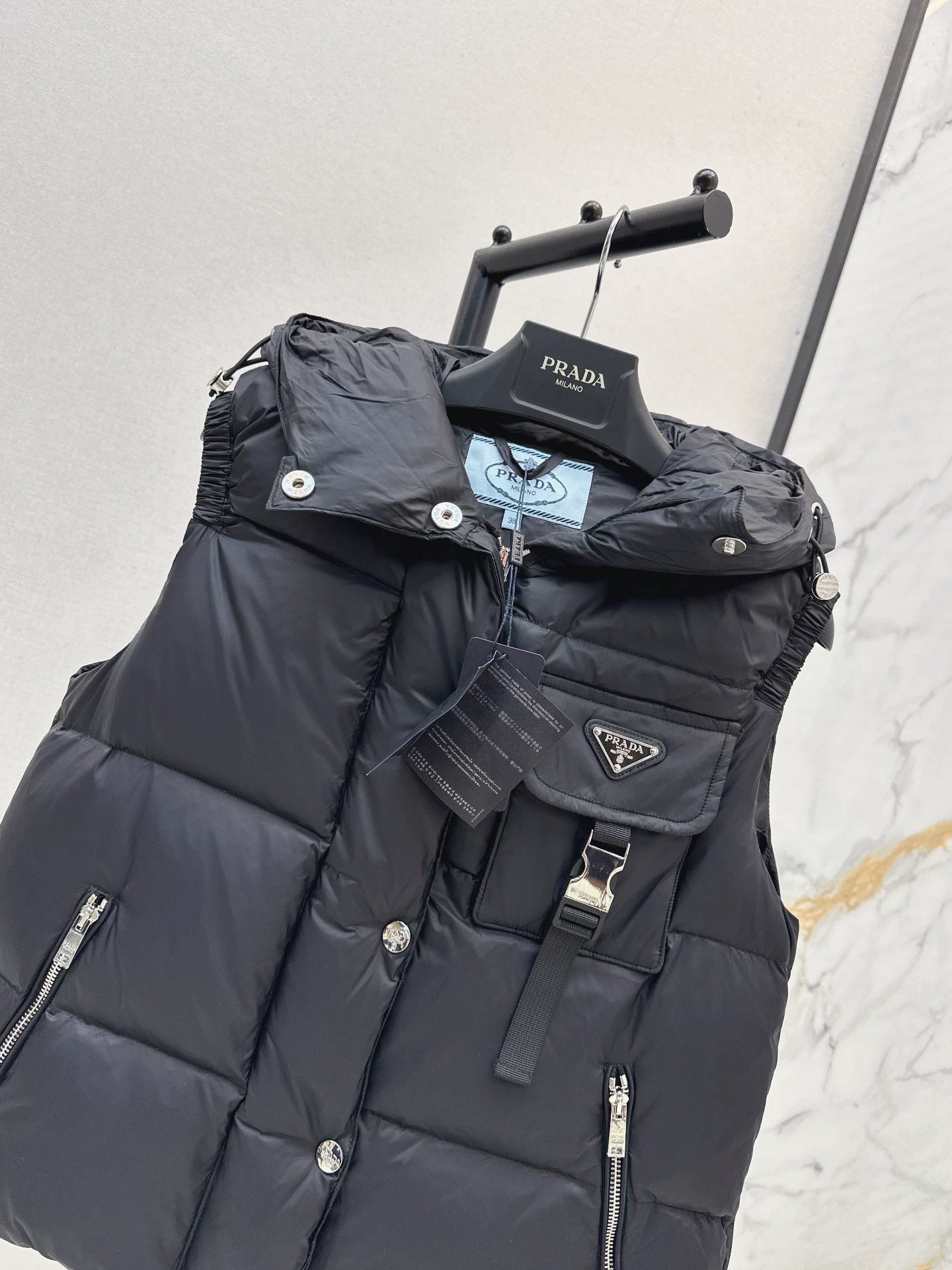 P 25fw hooded turtleneck down vest