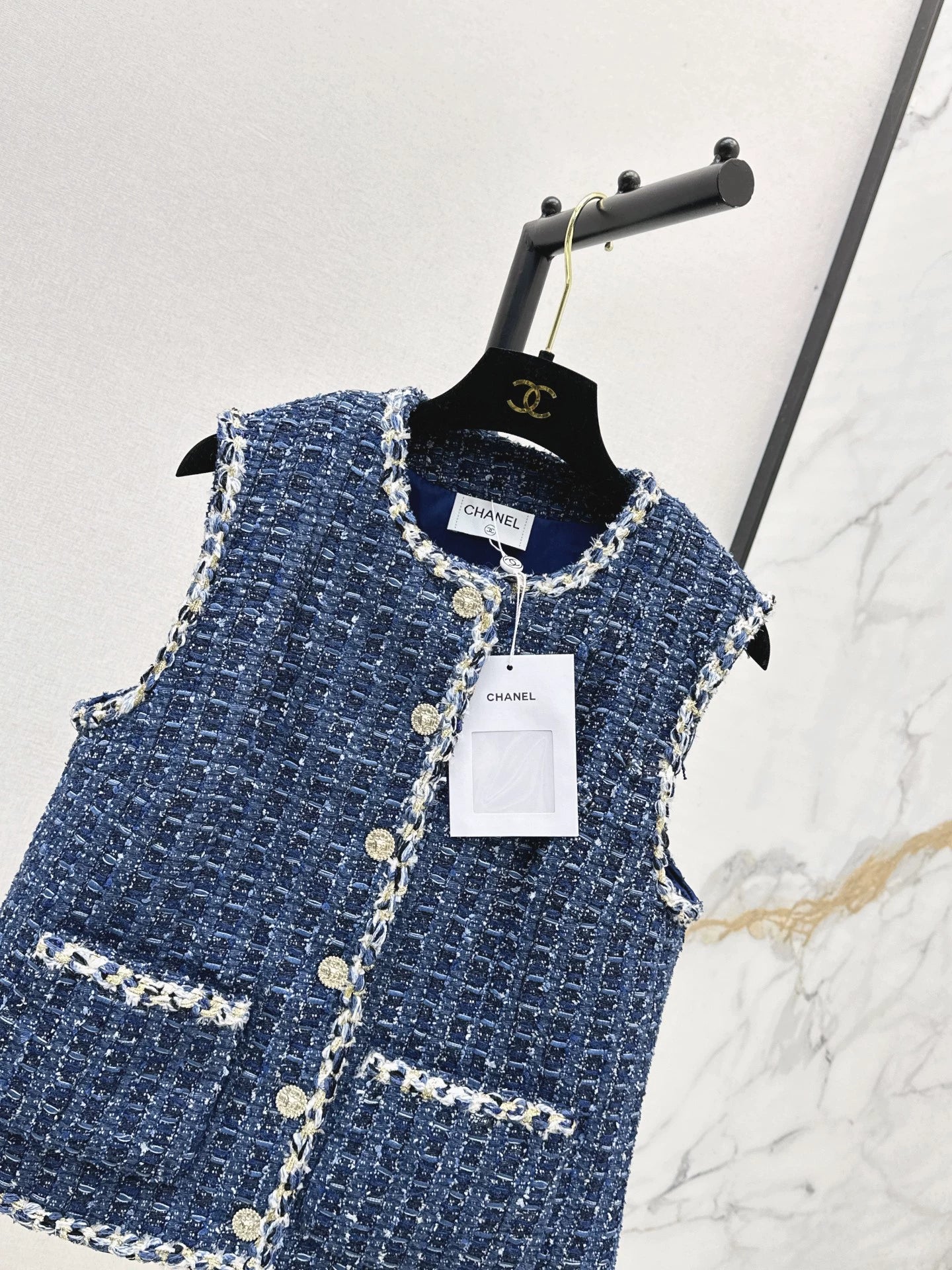 C 25 Model's sapphire blue tweed vest