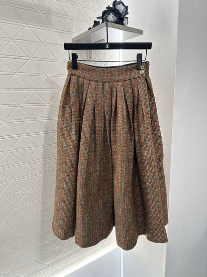 C 25 new styles featuring a lapel dress with beaded hem and skirt set.
