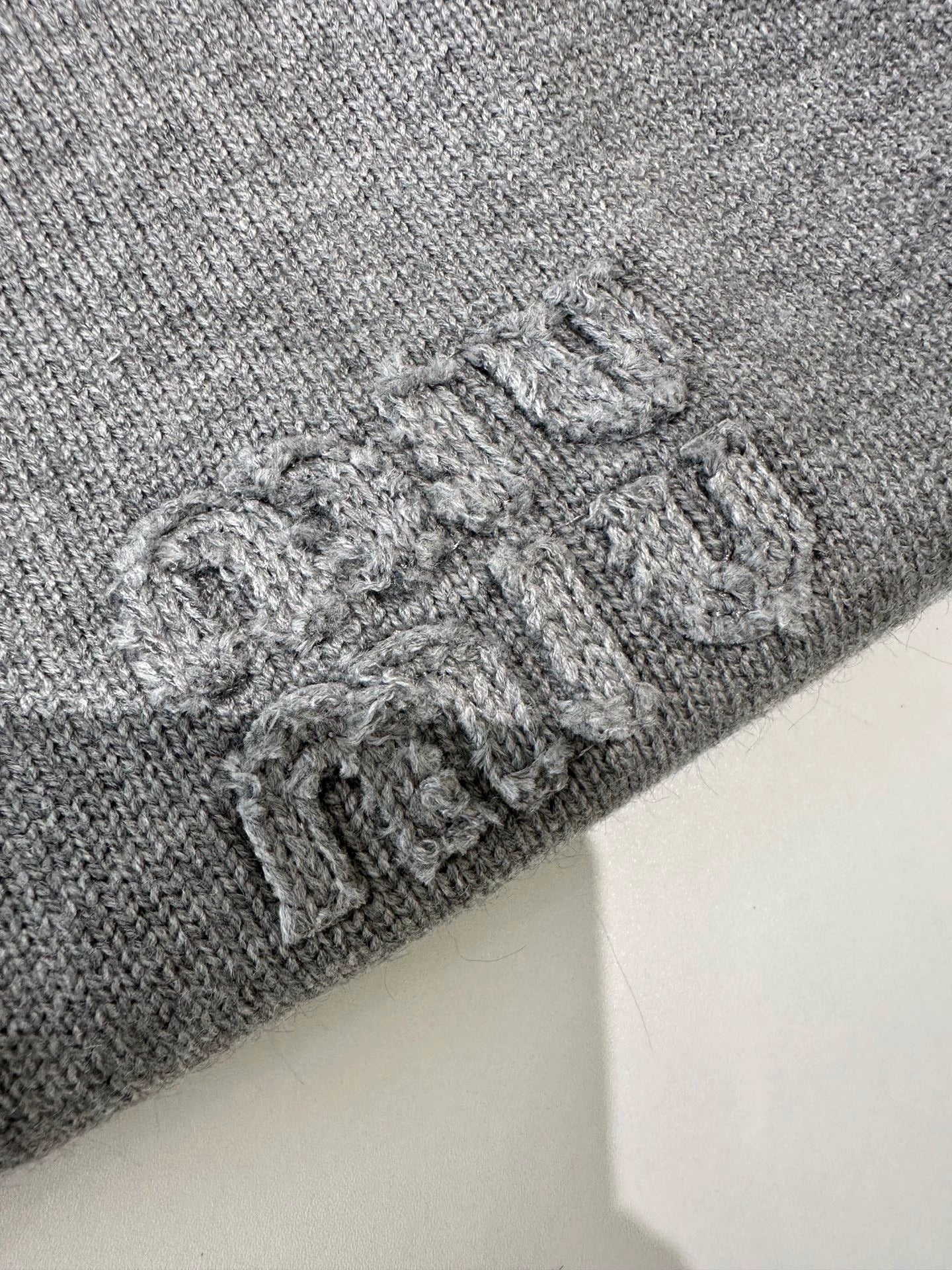 Mi 25 Crew-neck knitted cardigan with logo
