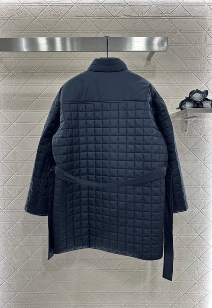 H 25 Stand-up collar, zippered mid-length padded jacket.