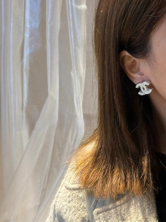 C 25 White enamel earrings