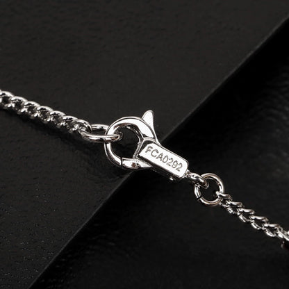 CE 25 Gold necklace with full diamond logo and Arc de Triomphe logo