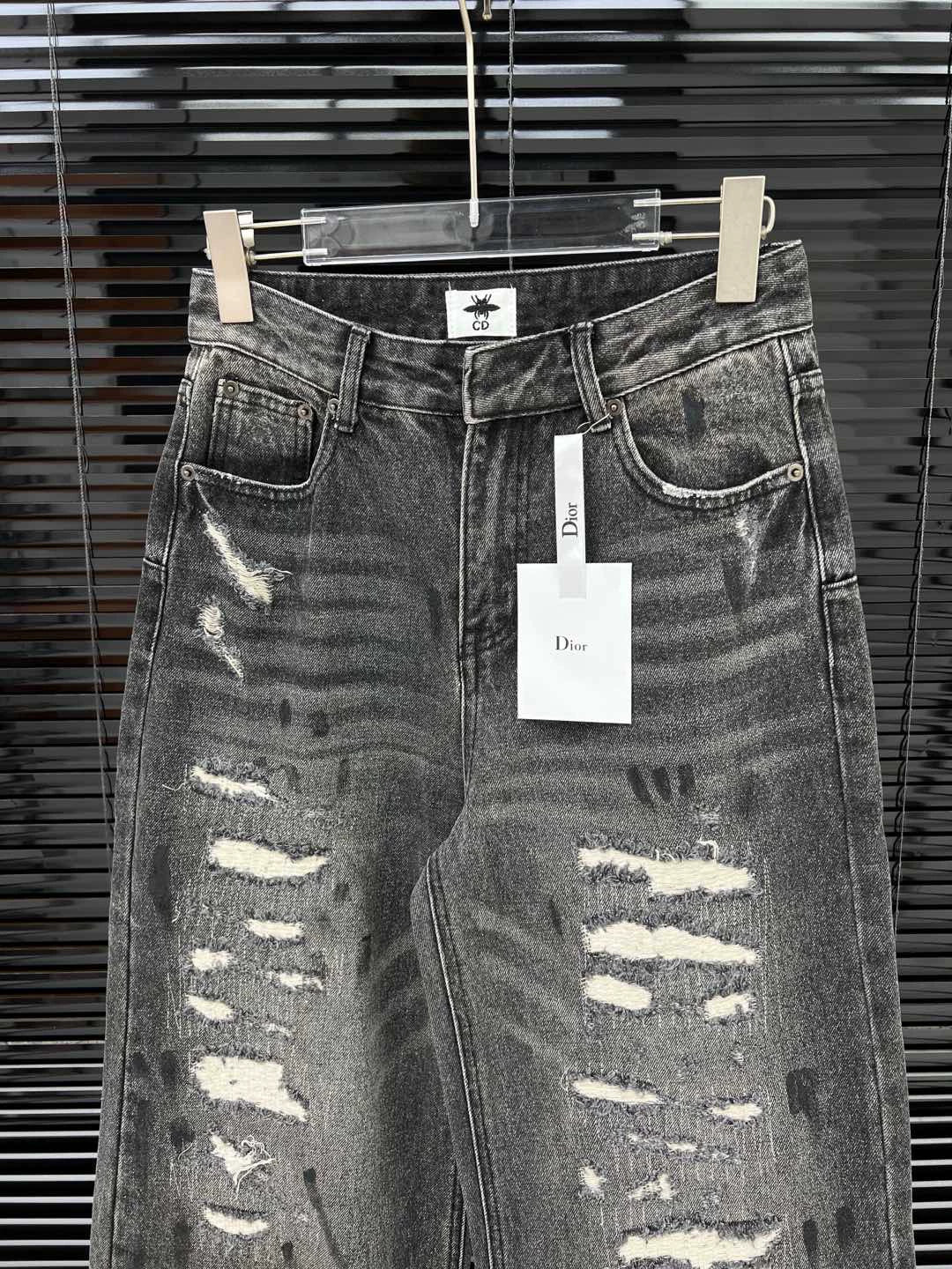 D 25 Ripped ink-splashed black and grey trousers Jeans