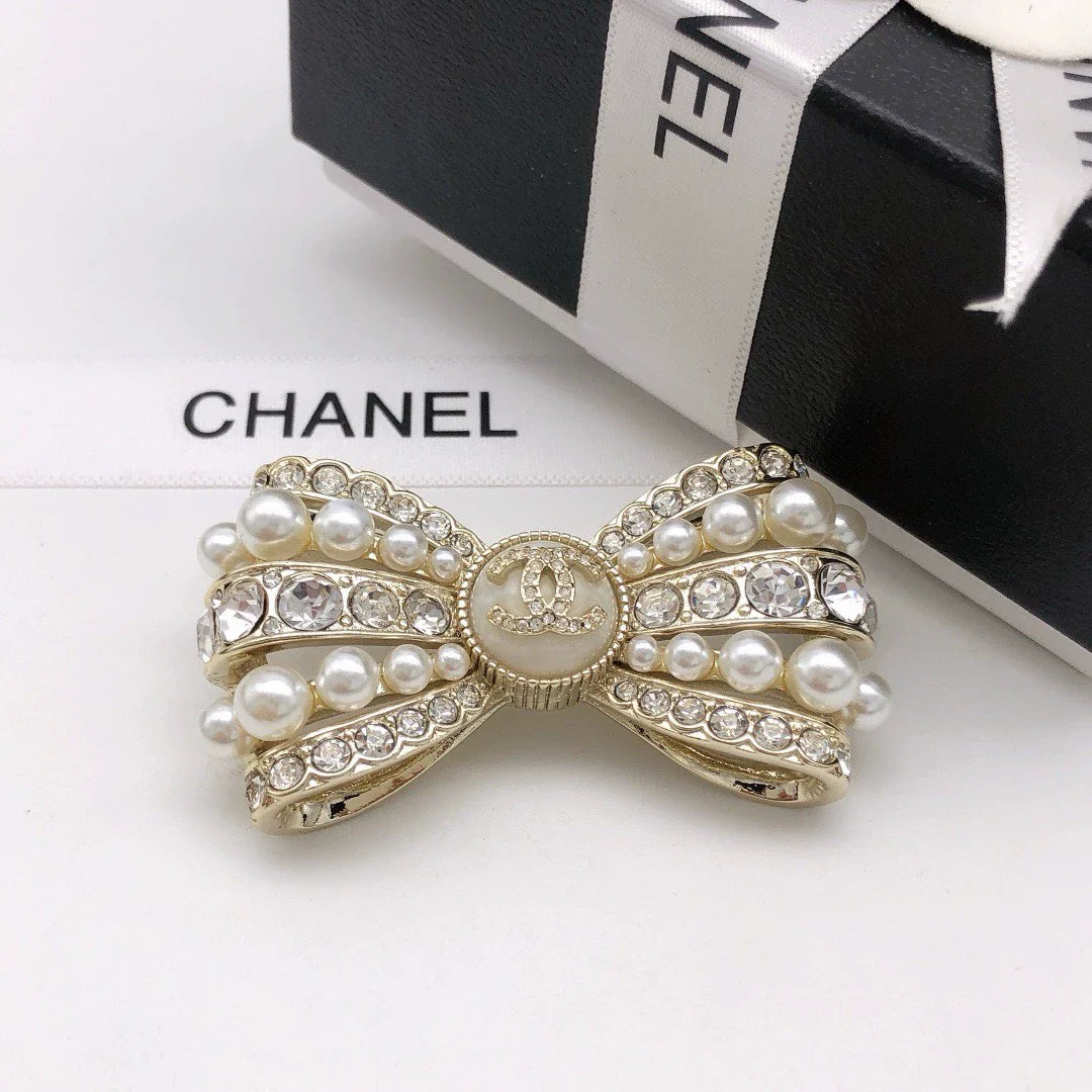 25 Summer new pearl diamond bow brooch
