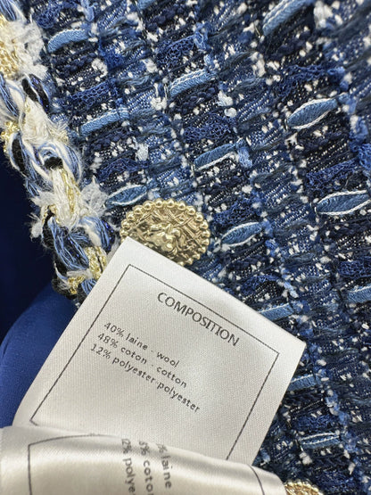 C 25 Model's sapphire blue tweed vest