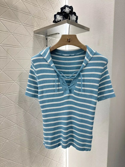 D Spring/Summer 25 Shawl-neck, striped knit short-sleeve top.