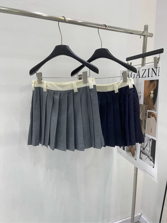 M 25 White-edge colorblock letter pleated skirt