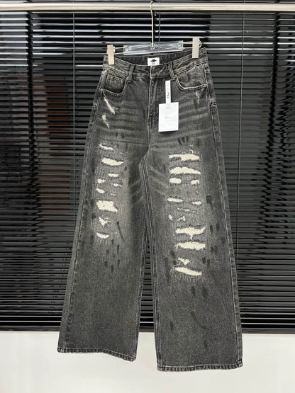 D 25 Ripped ink-splashed black and grey trousers Jeans