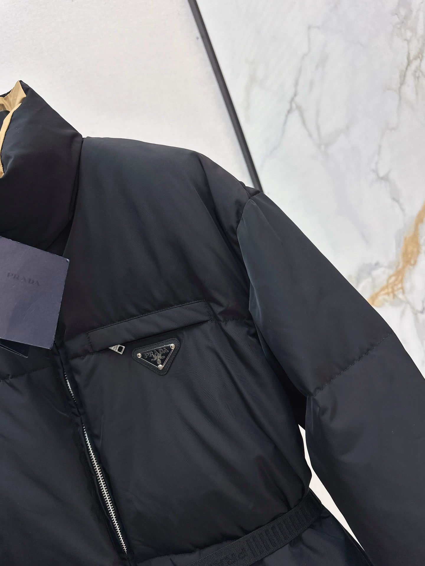 P 25fw Waisted mid-length down jacket