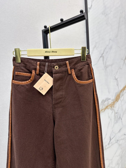 M 25 Brown jeans with leather detailing