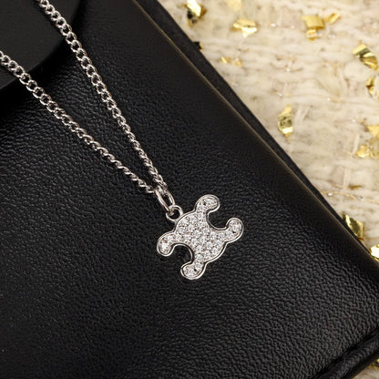 CE 25 Gold necklace with full diamond logo and Arc de Triomphe logo
