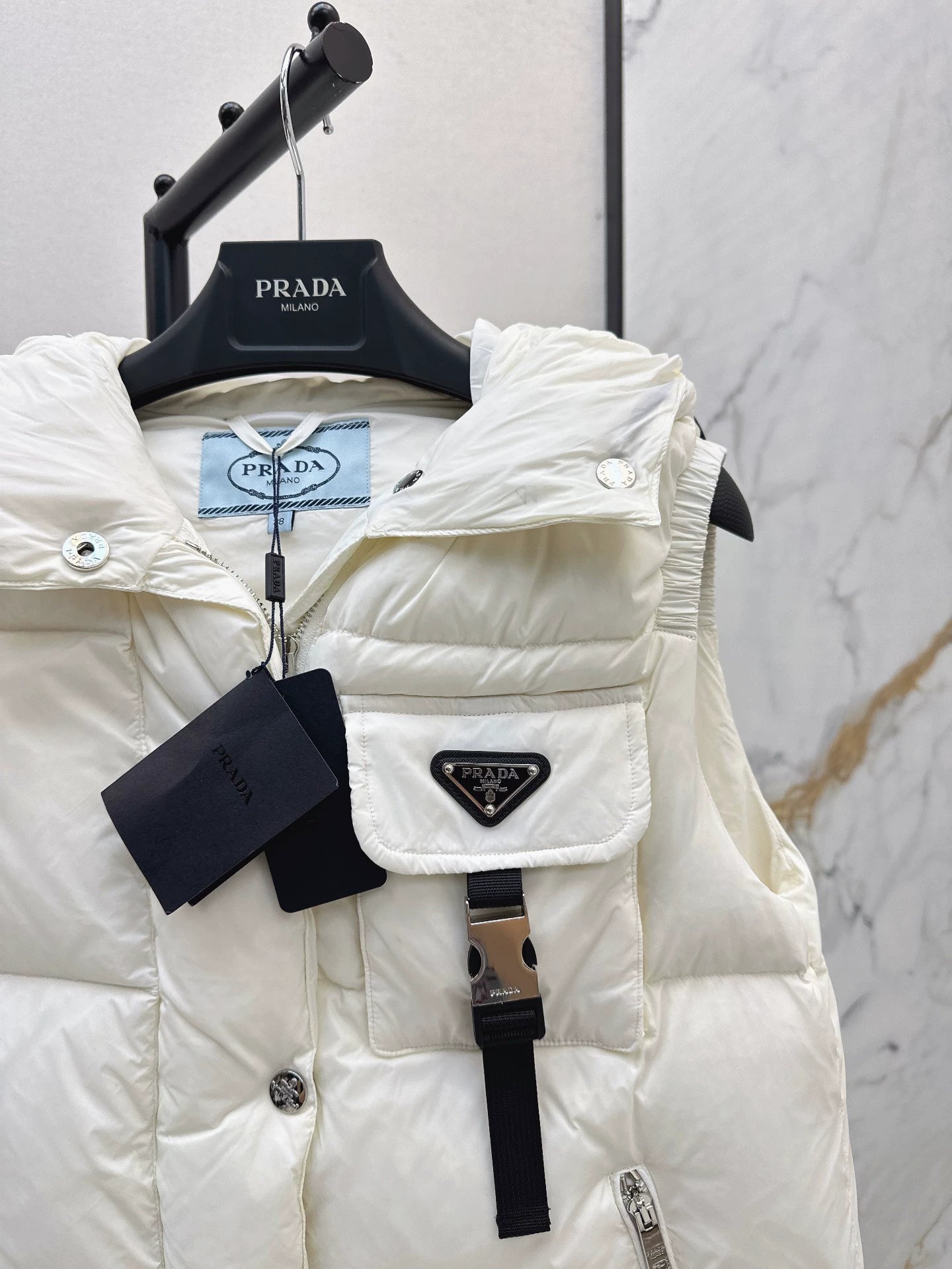 P 25fw hooded turtleneck down vest
