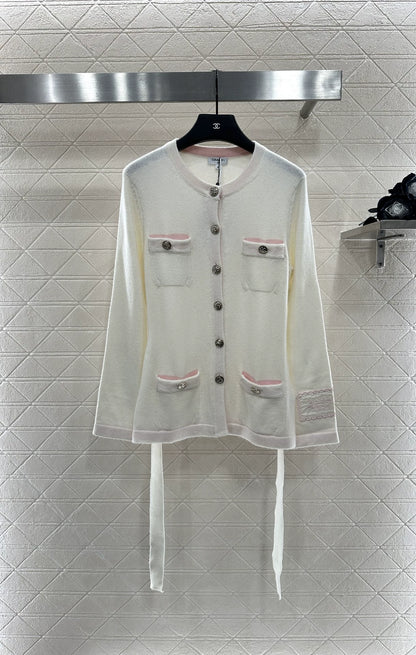 C New 25-item bag button and belted knitted cardigan.