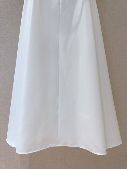 D 25 Mid-length with belt skirt