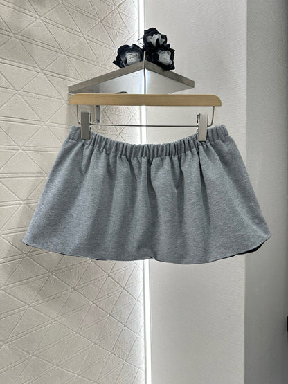 M 25 Reversible hooded jacket and skirt set