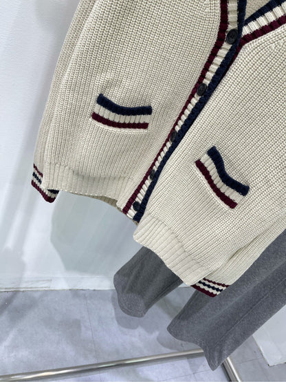 M 25Ss apricot red edged V-neck cardigan