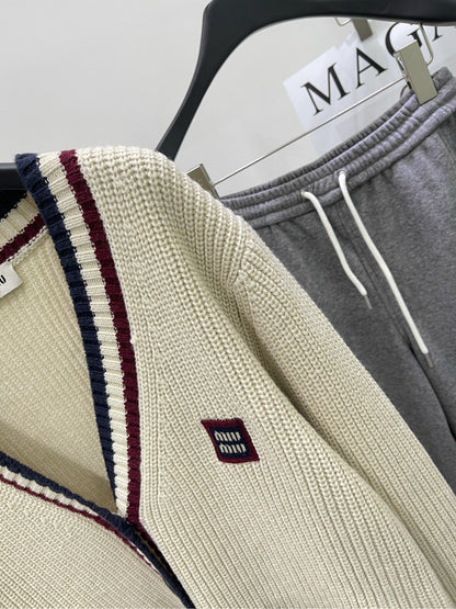 M 25Ss apricot red edged V-neck cardigan
