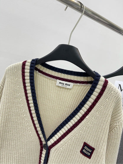 M 25Ss apricot red edged V-neck cardigan