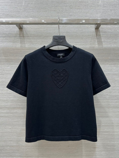 C 25 nouveaux produits, j'adore le haut à manches courtes en tricot double C 