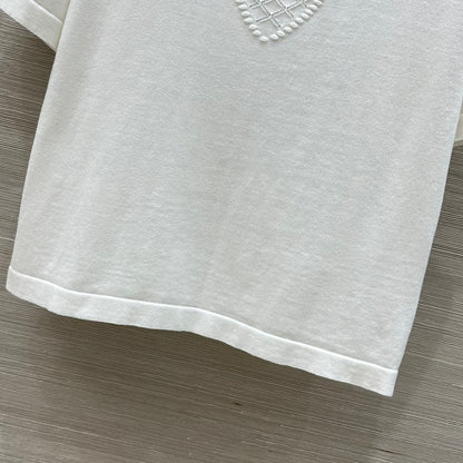 C 25 nouveaux produits, j'adore le haut à manches courtes en tricot double C 