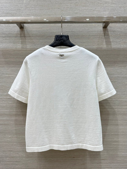 C 25 nouveaux produits, j'adore le haut à manches courtes en tricot double C 