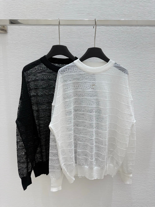 C 25 Early spring new round neck hollow knitting long sleeve