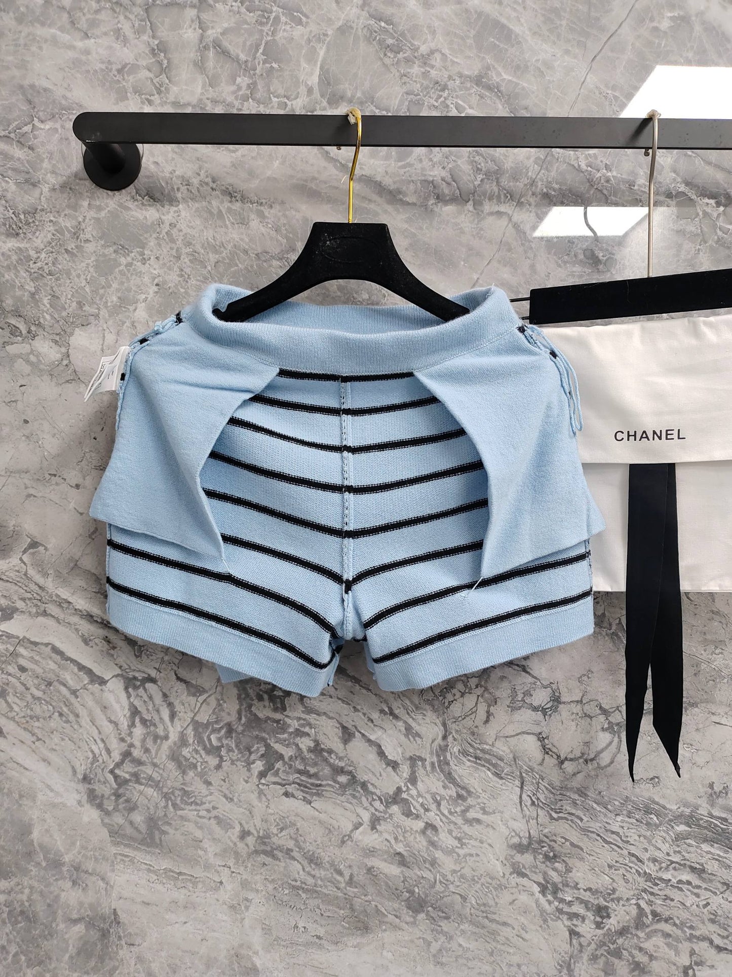C 25 Light blue and black striped Swallow buttons short skirt