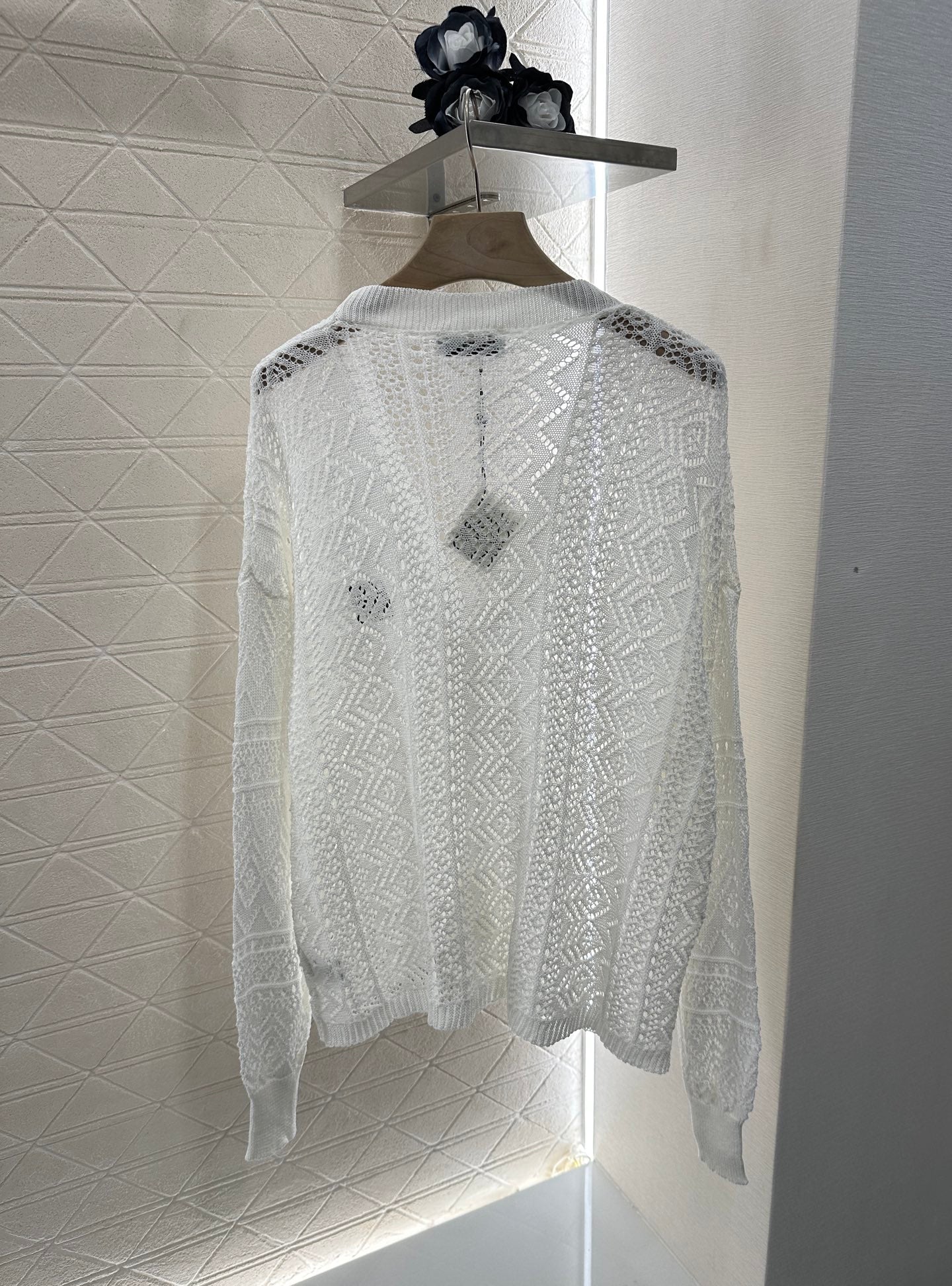 Lo 2025 new product Hollow cardigan and skirt set