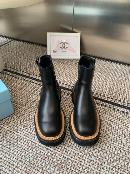Pra 25fw Classic matte black triangle ankle boots