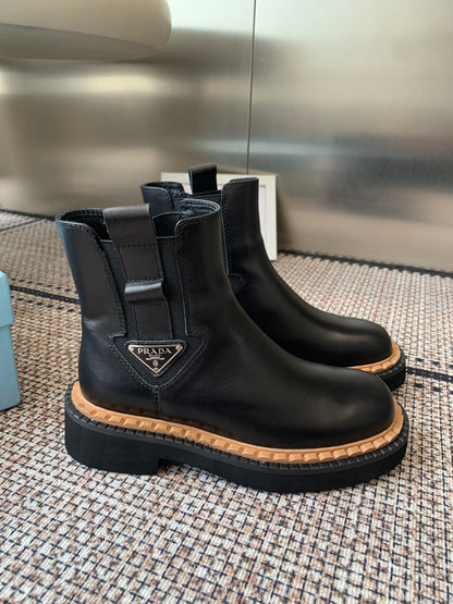 Pra 25fw Classic matte black triangle ankle boots