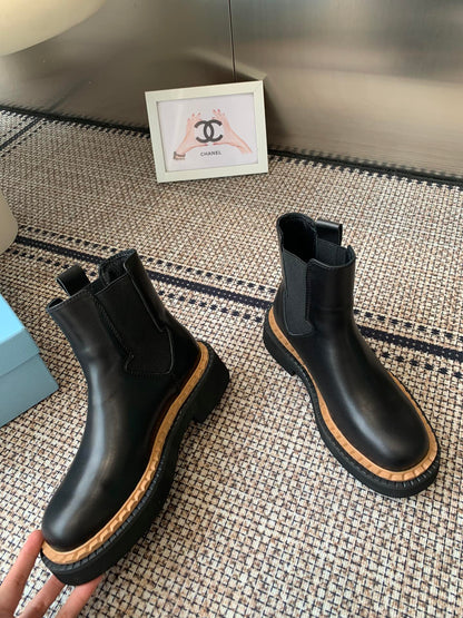 Pra 25fw Classic matte black triangle ankle boots