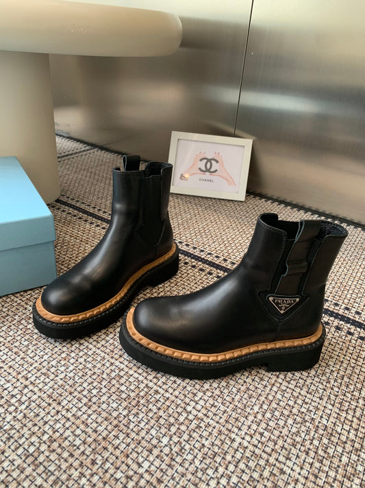 Pra 25fw Classic matte black triangle ankle boots