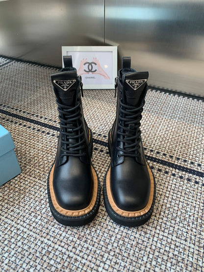 Pra 25fw Classic triangle-shaped ankle boots