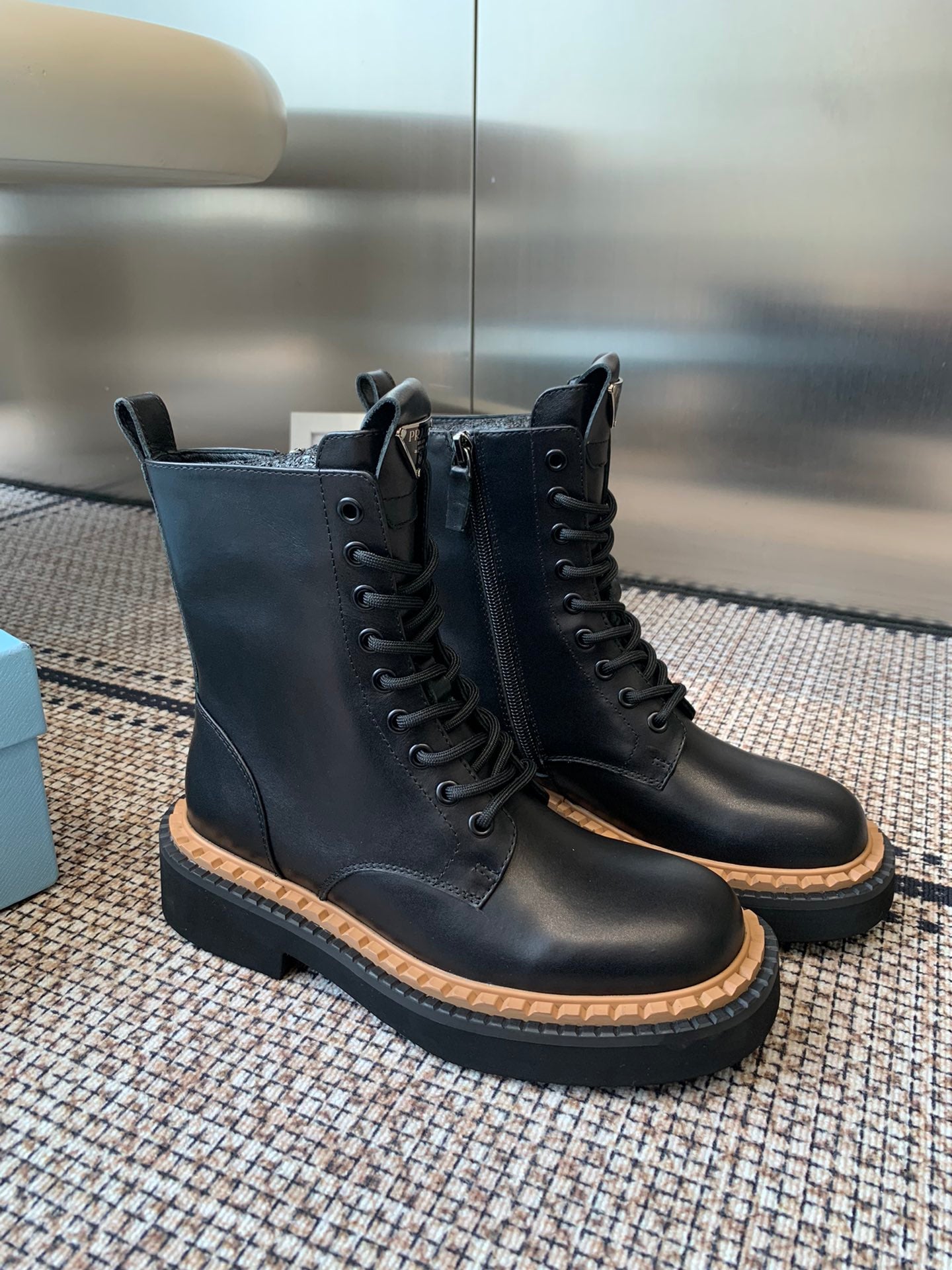 Pra 25fw Classic triangle-shaped ankle boots