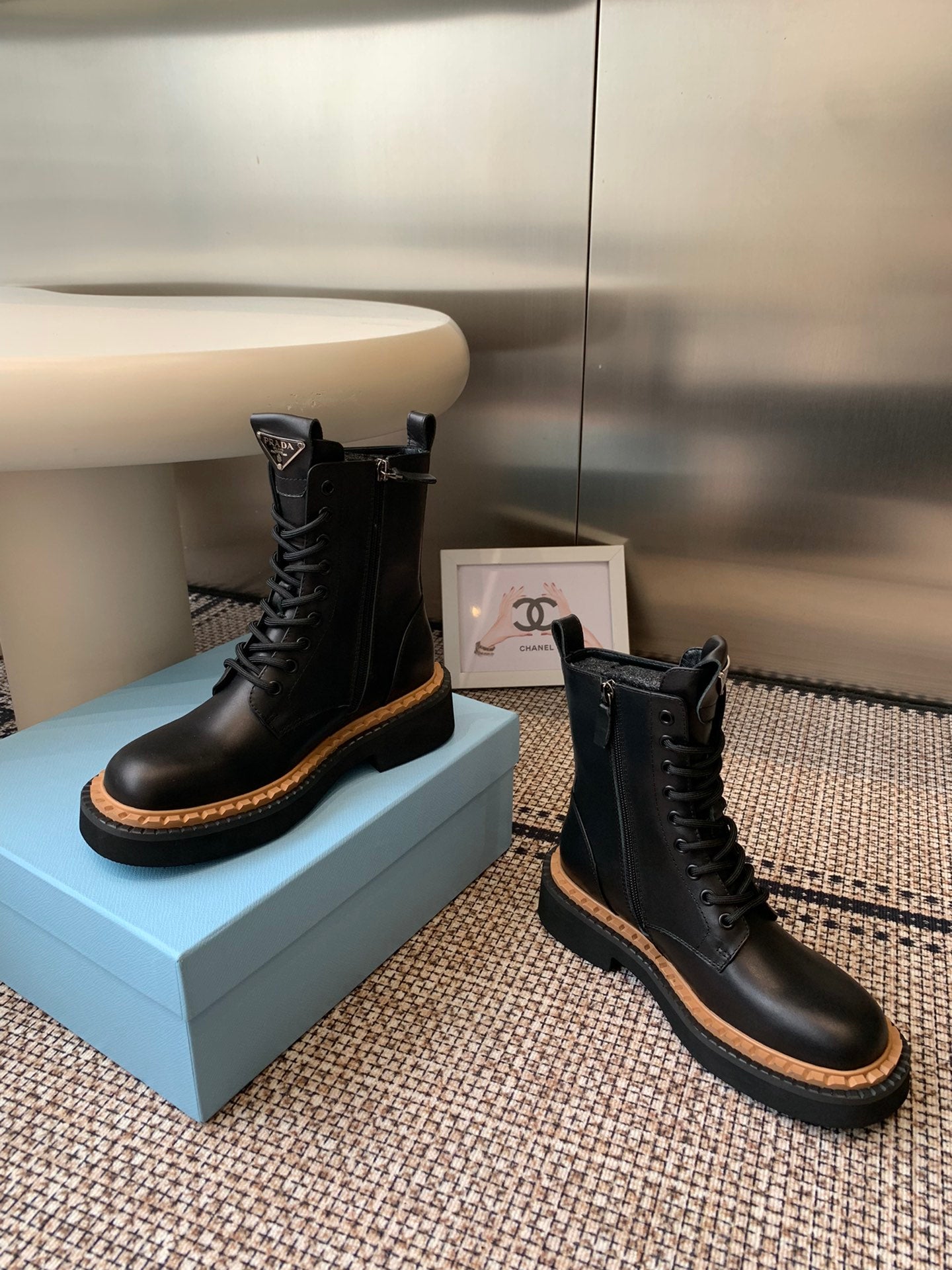 Pra 25fw Classic triangle-shaped ankle boots